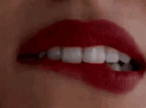 biting lip funny|lip biting kissing gif.